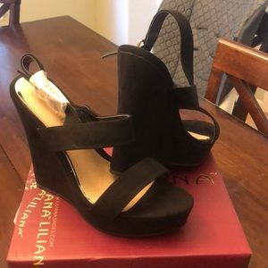 Lilian black wedges. NEVER WORN!